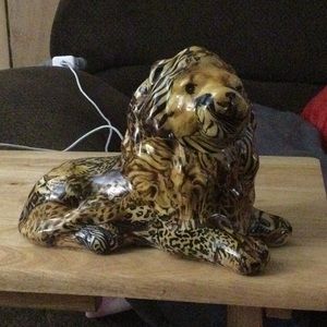 This is a lion ceramic statue from the 80s